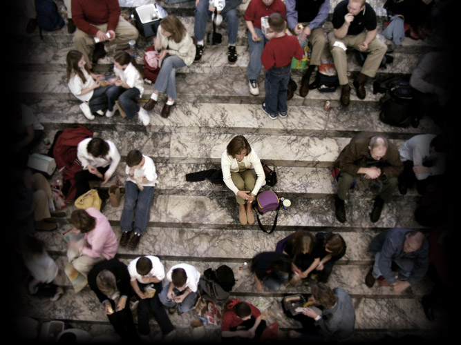 Woman Feeling Isolated in a Crowd
